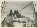 Image of Bowdoin at sea, left to right: Joe Field, Henry Warren, Ken Rawson, and Alfred 